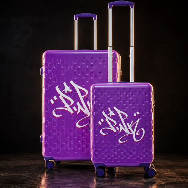 TROCHI X Line luggage collection with purple graffiti hardshell suitcases in luxury studio lighting
