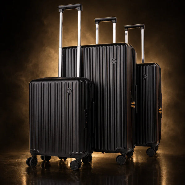 TROCHI Yellow Line luggage collection with black hardshell suitcases in gold studio lighting